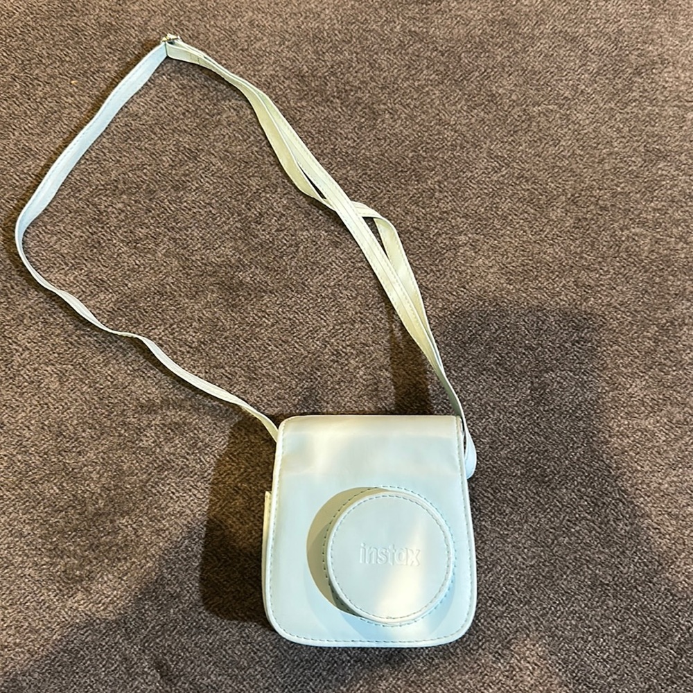 Light blue Fujifilm camera case